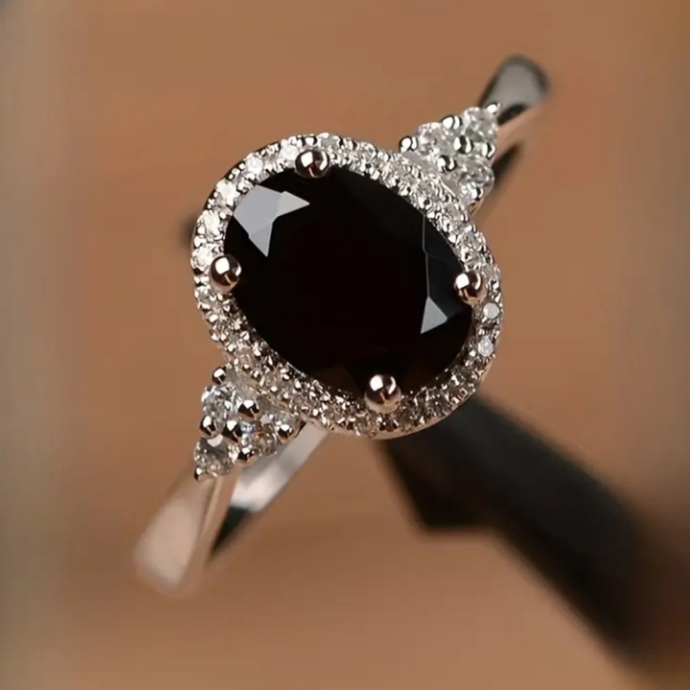 Sophisticated Women's Ring with Black Stone and Silver Band